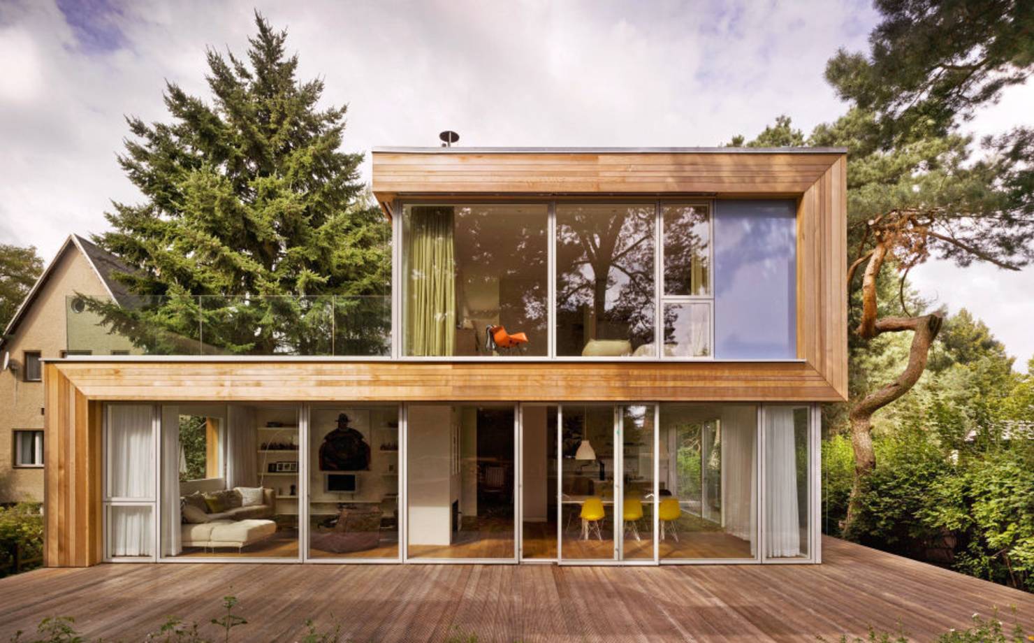 Каркасный дом с панорамными окнами и фото больших проектов